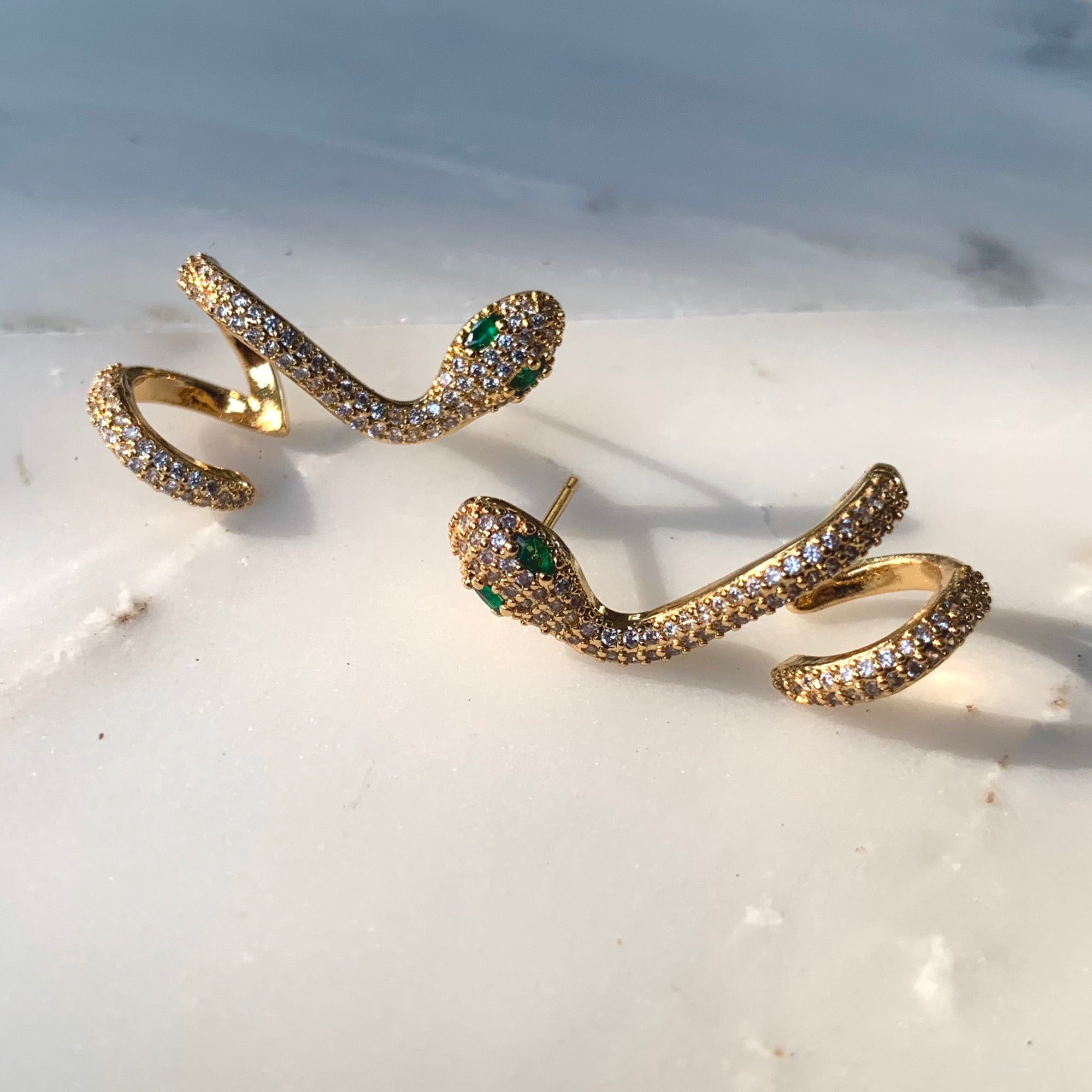 Snake studs online